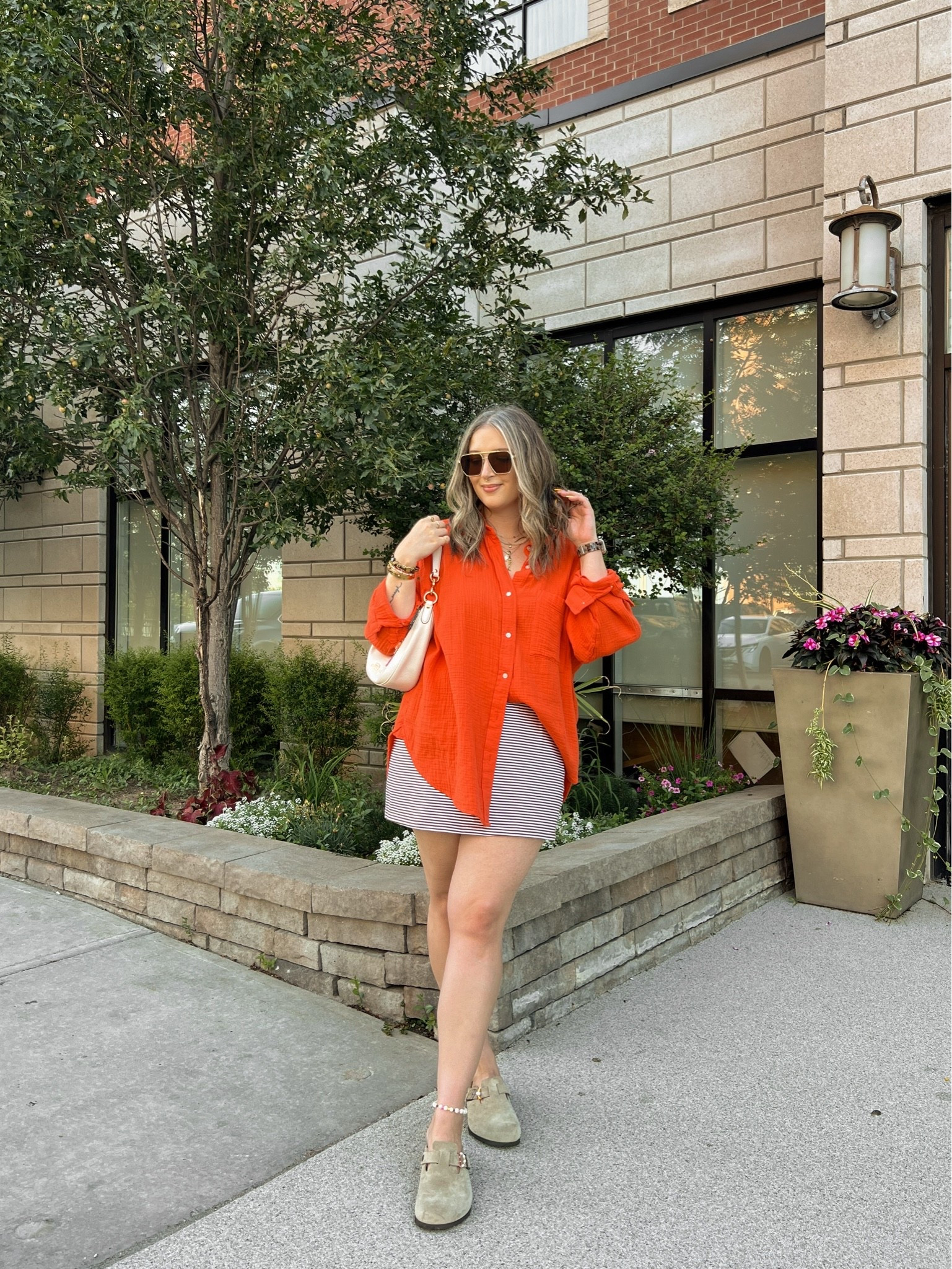 Easy summer outfit! Wearing my usual size L in both the red orange shirt and striped mini skirt (has built in shorts!). Birkenstock Bostons are super comfy, I’m a 9.5-10 shoe and wear size 40

#LTKsummer #LTKsale #LTKmidsize