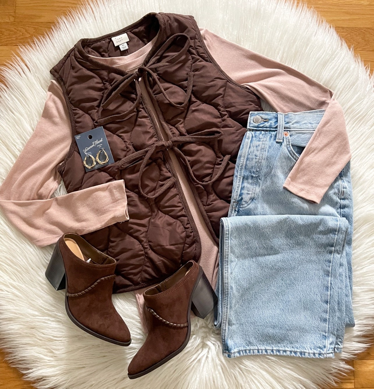 Found the cutest vest! Love the bows 🤩

#LTKFindsUnder50 #LTKSaleAlert