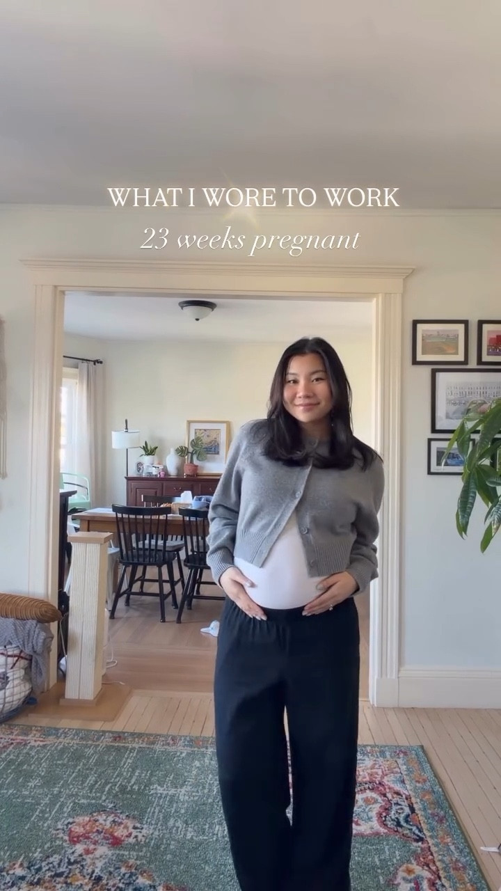 A little work OOTD. Temps are dropping here and it is getting chilly! This cropped cardigan doesn’t quite fit over the bump but we’re making it work!
.
.
.
.
-Favorite cropped cardigan doesn’t quite fit the bump but making it work. Size XS. 
-Linen black pants super stretchy and comfy 