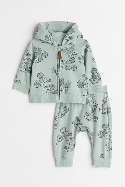 Conscious choice  Set with a hooded sweatshirt jacket and sweatpants in patterned fabric with a s... | H&M (US + CA)