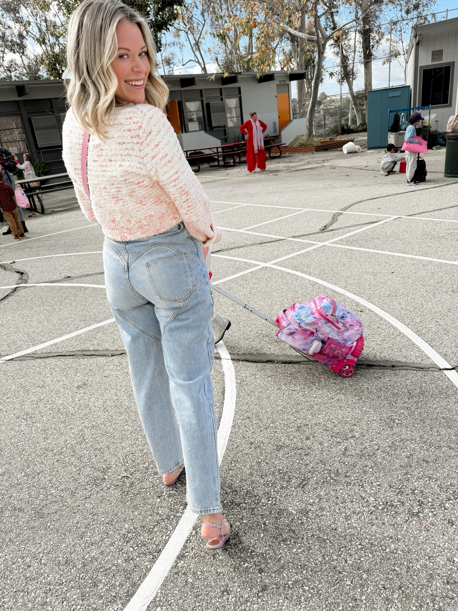 Amanda’s jeans have the cutest heart detail on the back, and are even cuter on the front! Happy Valentine’s Day! 

Amanda’s Self-Portrait sweater is no longer available, but we found you some similar styles  

— Kimberly | Team AF 

#LTKSeasonal #LTKMostLoved #LTKShoeCrush