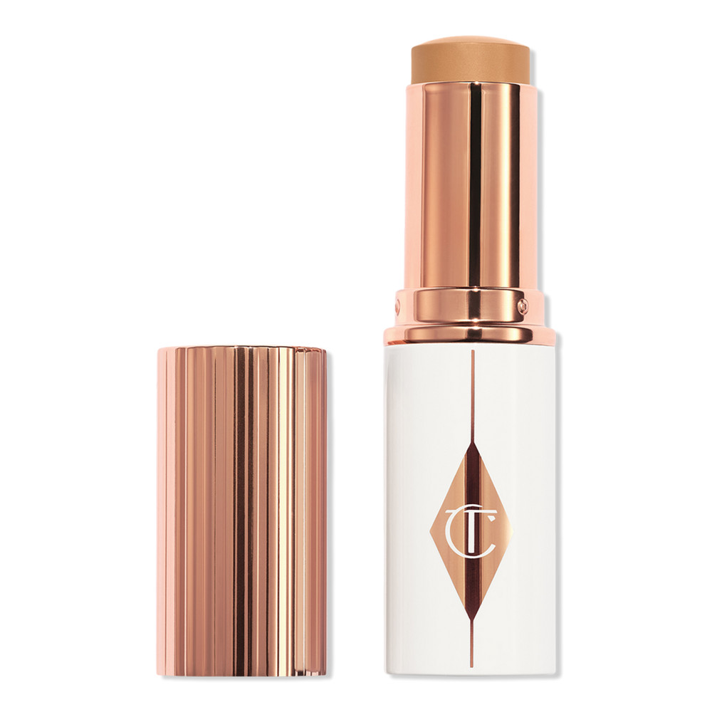 Charlotte Tilbury Unreal Skin Sheer Glow Tint Hydrating Foundation Stick - 9 Tan | Ulta