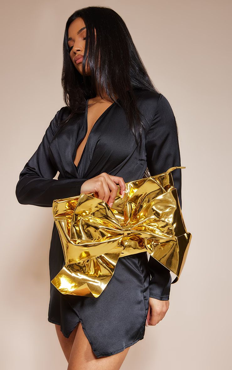 Gold Metallic Oversized Bow Clutch Bag | PrettyLittleThing UK
