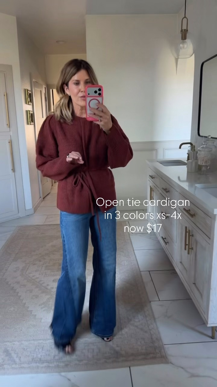 Wearing a small sweater and size 27 or 4 regular at jeans