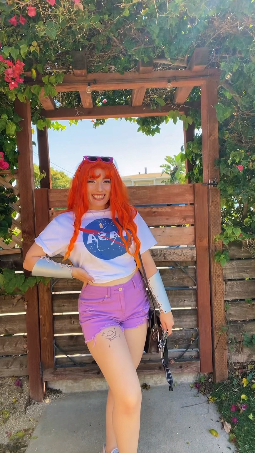My Starfire cosplay from comic con this year! I love wearing such a comfy t-shirt and purple shorts while still being all dressed up! This is a good costume for people who want to be comfy! 

#LTKHalloween #LTKHoliday #LTKstyletip