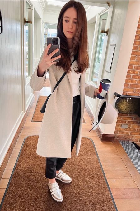 Easy mom style. Leather pants, basic white tee, fun sneaker, hat, and long wool blend coat #momstyle #leatherpants 

#LTKfindsunder100 #LTKfamily #LTKstyletip