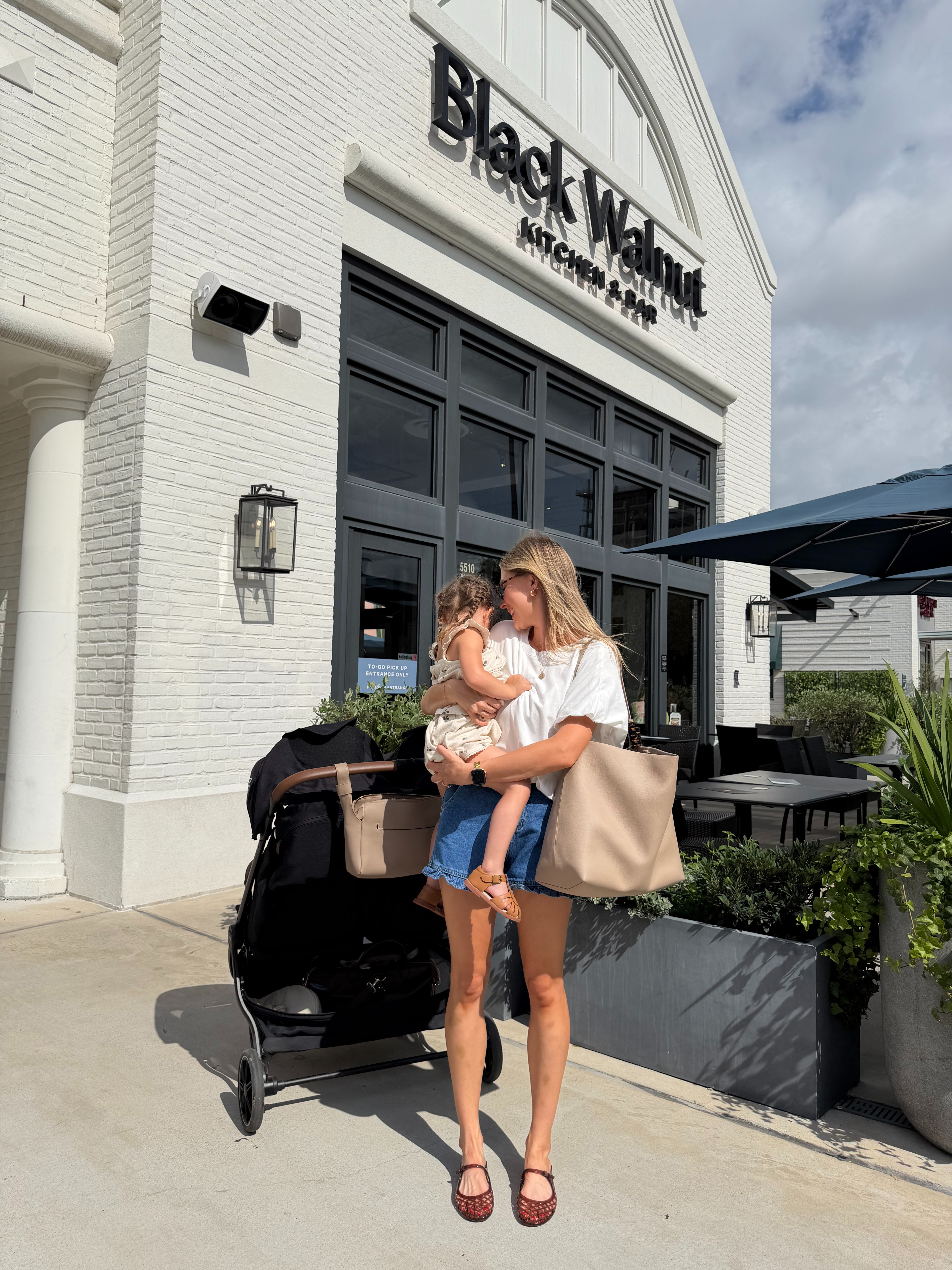 Nursing friendly summer mom outfit | 2 in ruffle denim shorts + M in white bubble tee  

 #LTKootd #LTKmomlife #LTKKids
