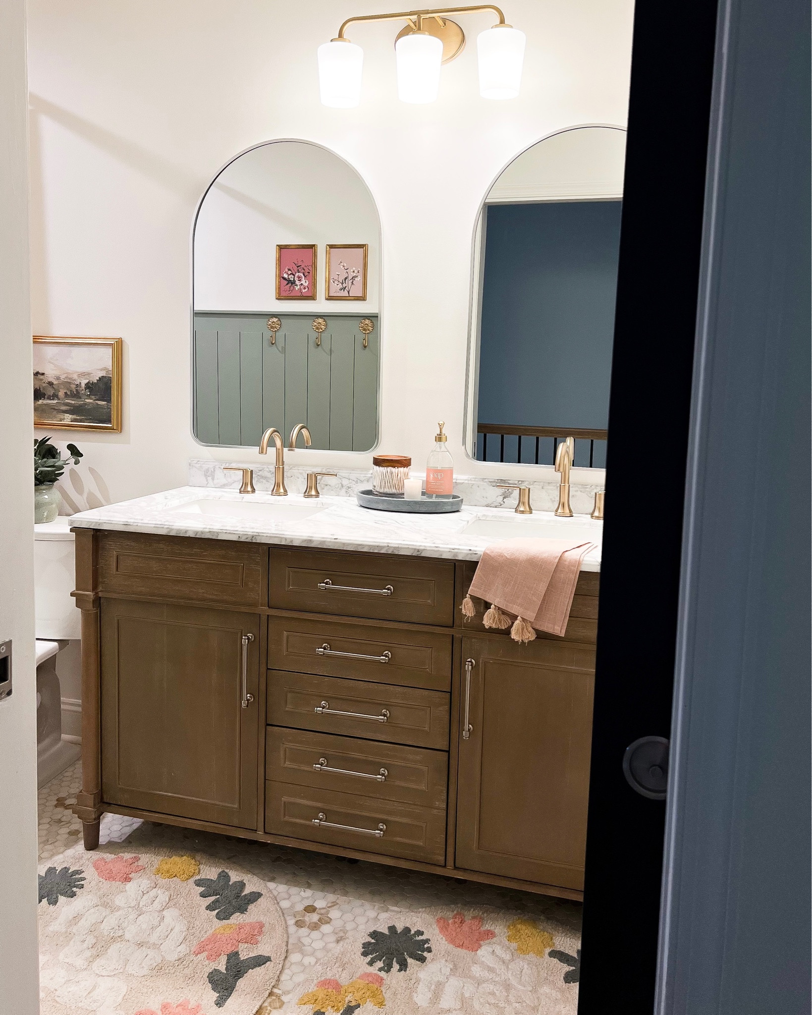 Little girl’s bathroom remodel, kid’s bathroom, vanity, arched wall mirrors, delta faucet, marble flooring, gold and nickel hardware 

#LTKhome #LTKfamily #LTKkids