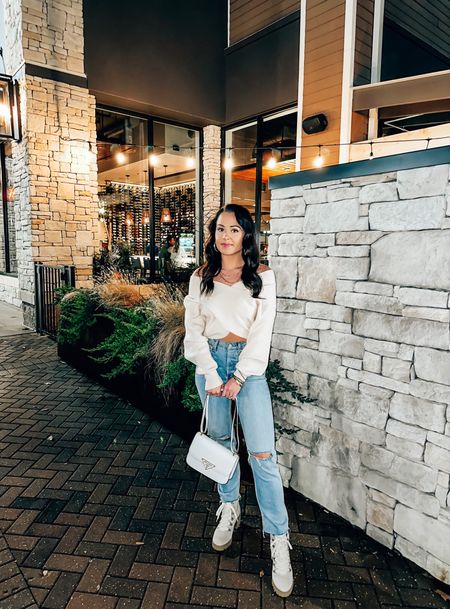 Under $40 amazon cross front sweater (small, 10+ colors), under $50 amazon fur winter lace up boots, $25 target jeans (2, tts) — the perfect winter date night or snow outfit! ❄️ #founditonamazon 

#LTKSeasonal #LTKunder50 #LTKshoecrush