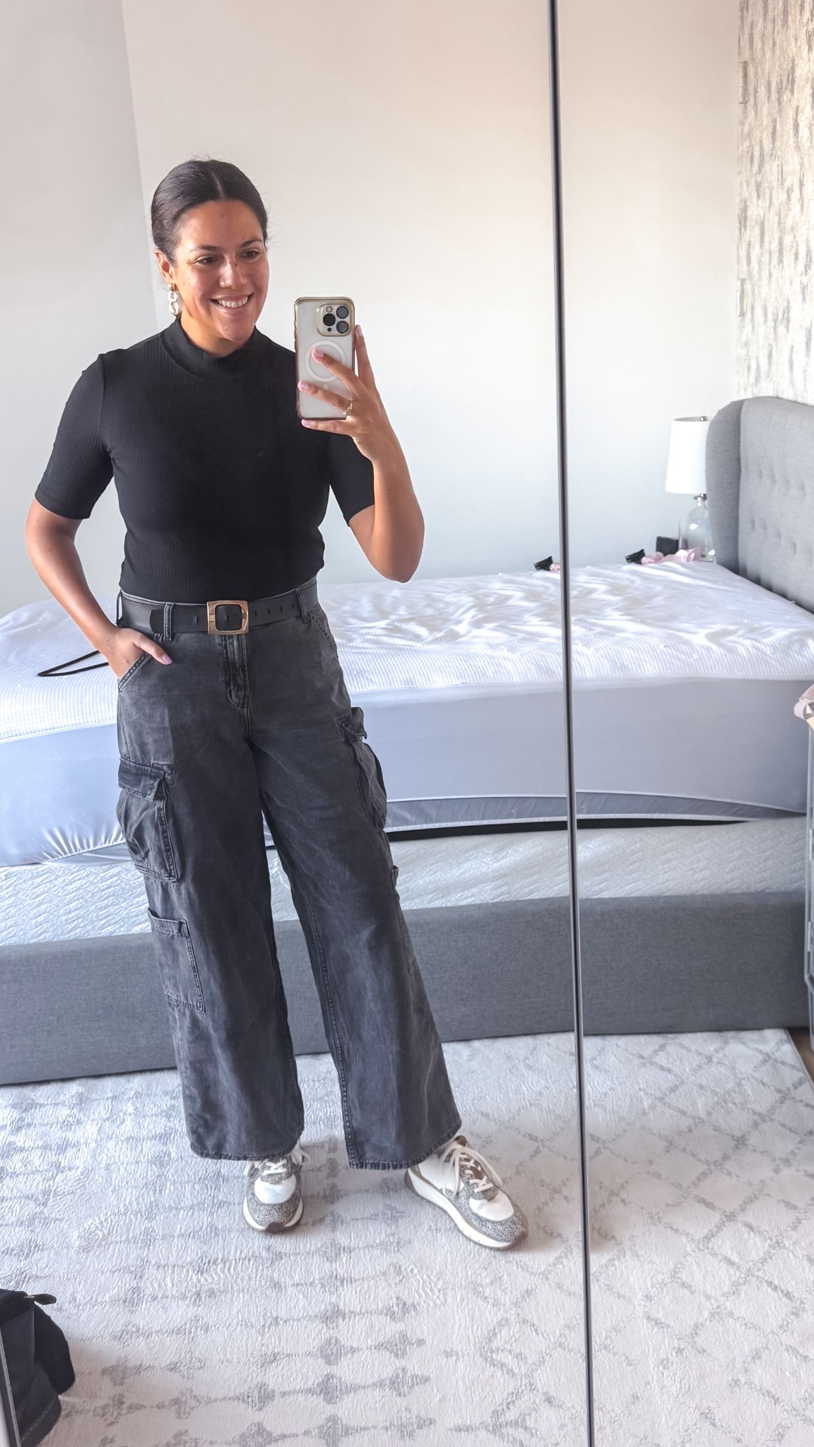 I’ve been loving all black outfits lately - who am I?? A tucked-in mockneck tee adds a bit of refinement to baggy cargo jeans, and fun sneakers made the whole thing pop! 

Mockneck from amazon, size M (TTS)
Old Navy baggy cargo jeans, size 10T (TTS)
Madewell sneakers, size 11 (TTS)

#LTKFindsUnder100 #LTKMidsize #LTKFindsUnder50
