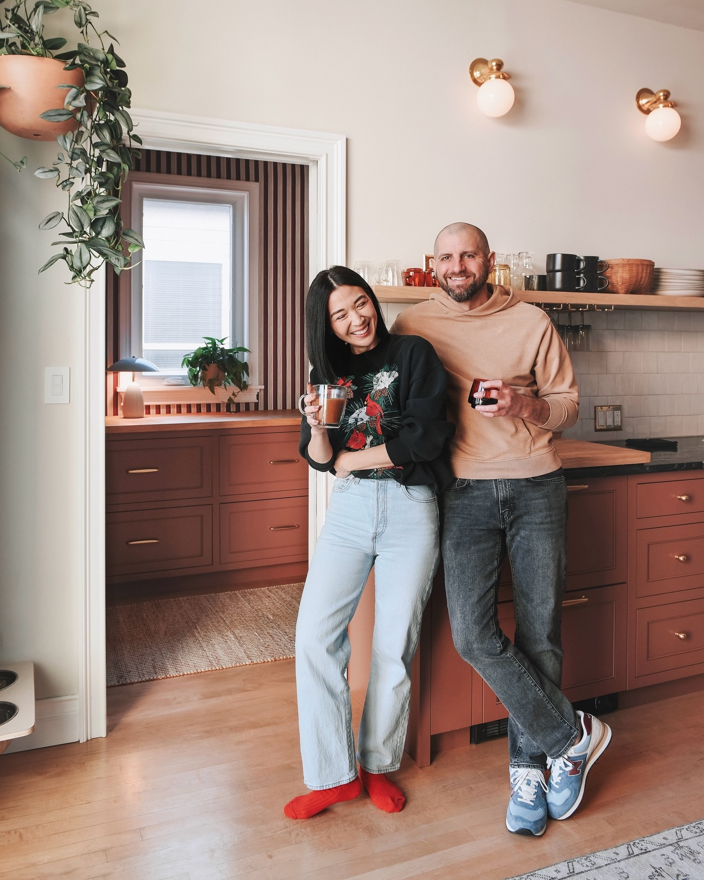 Hi, there! We’re Kim + Scott, Chicago-based home designers creating rooms that feel like a hug. We’ve been building an online community of fellow home-obsessed friends for almost 17 years, and we’re so happy you’re here! Here’s what you might not know about us, on a more personal note.👇

▪️We were neighbors in college, fell in love over our shared joy of music and horror films, married in 2008, and have been together for over 22 years.

▪️Yellow Brick Home started and as a blog in 2009, where we wrote about transforming our builder-grade Chicago condo together – all 650 sq ft of it! The blog is still active today, and the name Yellow Brick Home is an ode to the yellow brick exterior of the condo building, the first home we purchased together in Chicago!

▪️While struggling with infertility (a pain I wish on no one), we booked a weekend away in nearby Sawyer, Michigan to take a brain break. We were instantly smitten with the area, bought a tiny fixer upper, and we now rent that home on Airbnb! (We later found out I was pregnant on that very trip.🥹)

▪️Pet rescue is our passion. We’ve adopted 5 pets together (not all at the same time of course!) and as a small human family of 3, we find endless joy over fostering dogs in search of their forever homes.

▪️Speaking of, we’re a family of 3 by choice, and waiting until our mid-thirties to have a child was intentional (albeit delayed by fertility issues). Our daughter Lucy just turned 8, and we consider ourselves a power trio! We are complete.

▪️We’d describe our style as cozy, classic, and cheeky. We enjoy sharing ways to make your home feel warm and achievable – with a dash of quirk.

▪️Smaller homes have our hearts all day long. A tiny home encourages creativity, outside-of-the-box problem solving, and endless opportunities for togetherness.

▪️We believe in equal rights of all people, love is love, and gun reform NOW, because our kids deserve a safer, better world than the one they’re on track to inherit.

If you’d like to share, we’d love to learn something about you! xx