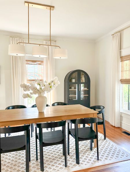 Dining room views!

We recently updated this space by painting the table, updating the light fixture to this affordable linear one, added new chairs, new rug, painted, new curtains and added blinds and this affordable arched cabinet too!😍

Dining Room Decor | Affordable Home Finds | Linear Chandelier | Neutral Dining Room

#LTKSaleAlert #LTKHome
