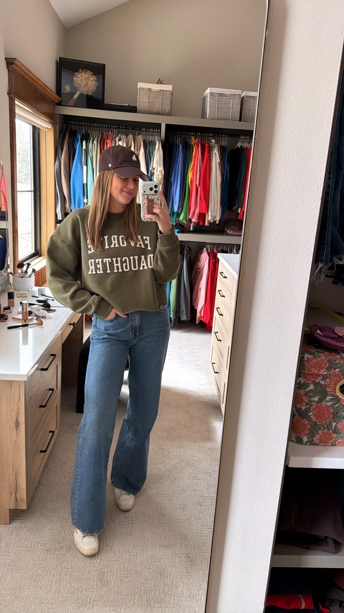 Size M sweatshirt
Size 29 jeans
If in between sizes, go down on both