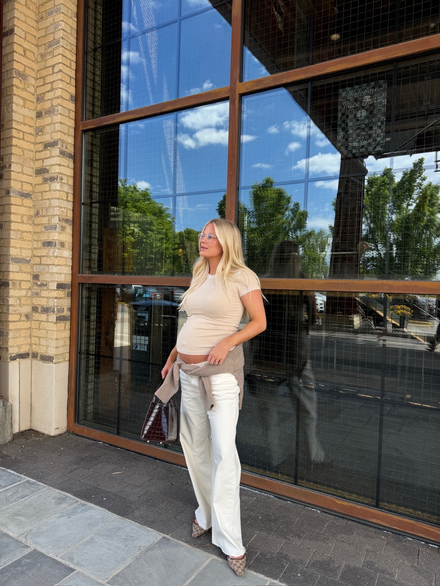 SIZE: medium in top, 31 in jeans (sized up for pregnancy- cut the bottom for a frayed hem), med sweater (tied on my waist), shoes are tts, linked similar bags! #kathleenpost

Casual chic outfit, spring transition look, spring outfit 2026, bump friendly, maternity look

#LTKootd #LTKSeasonal #LTKBump