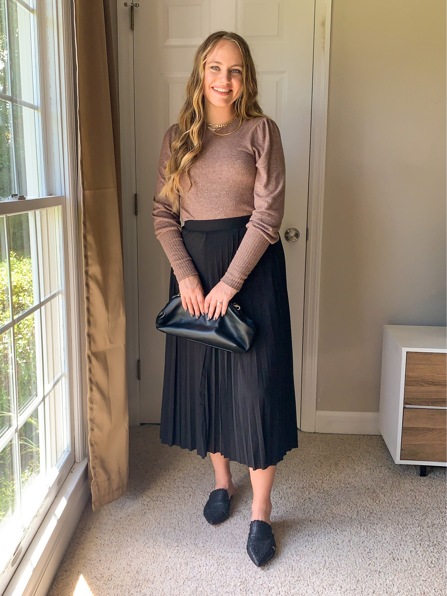Cute fall midi black skirt outfit idea!! I linked lots of several items since as brown long sleeve tops, black clutch bag purses, black pleated midi skirt, and black mules! Great church outfit idea, work outfit idea, or date night outfit idea!! More fall outfits on my page! 

#LTKwedding #LTKworkwear #LTKitbag