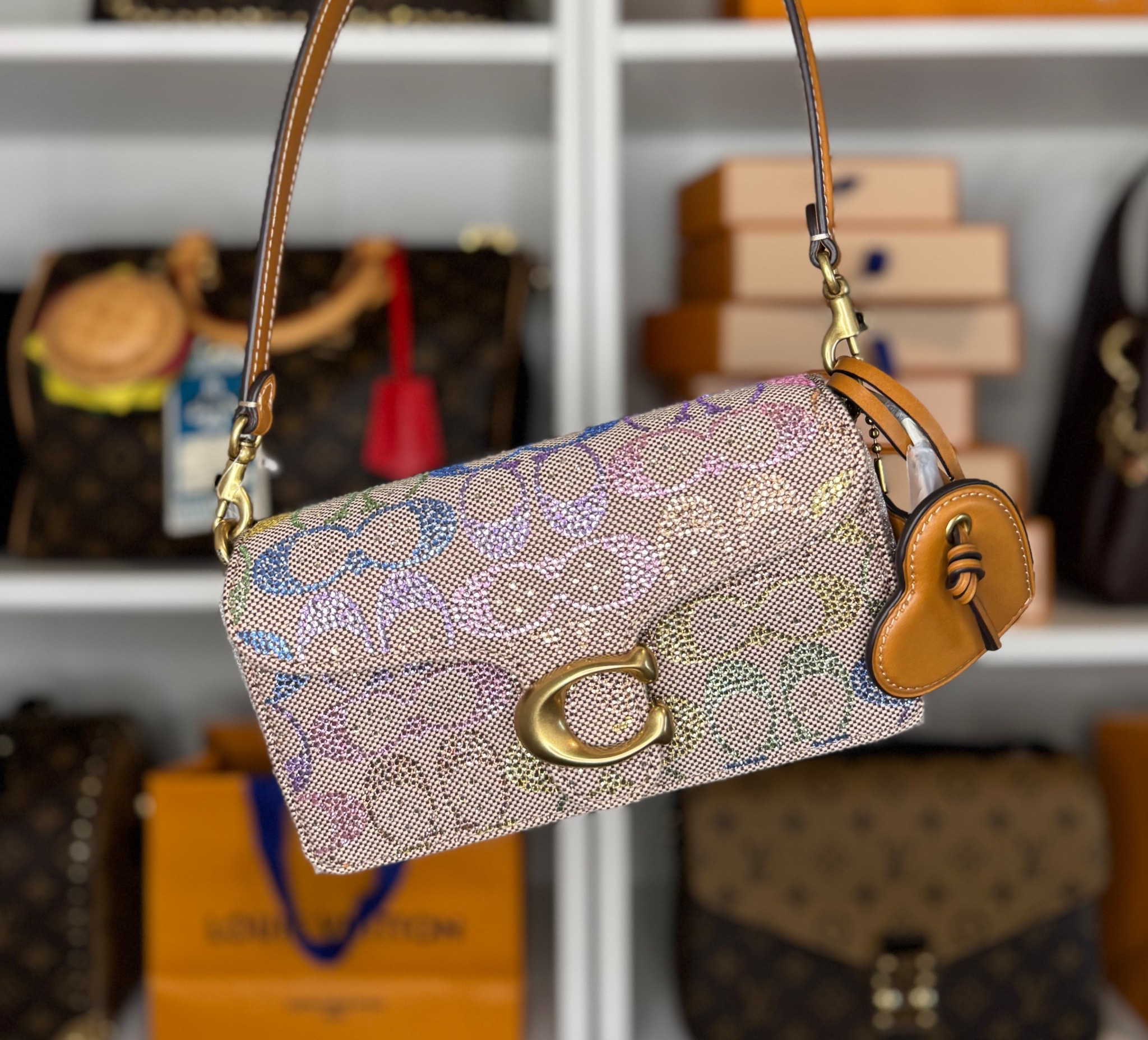 The Coach Rainbow Crystal Tabby 20 gives sparkle for days, mood for life. ✨👜 #Coach #Tabby20

#LTKSeasonal #LTKHoliday #LTKGiftGuide