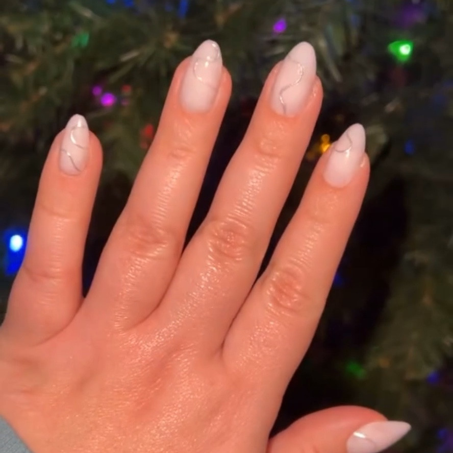 Super cute white nails with a touch of silver sparkle 🤍 lasts 2+ weeks 

#LTKbeauty #LTKstyletip #LTKplussize