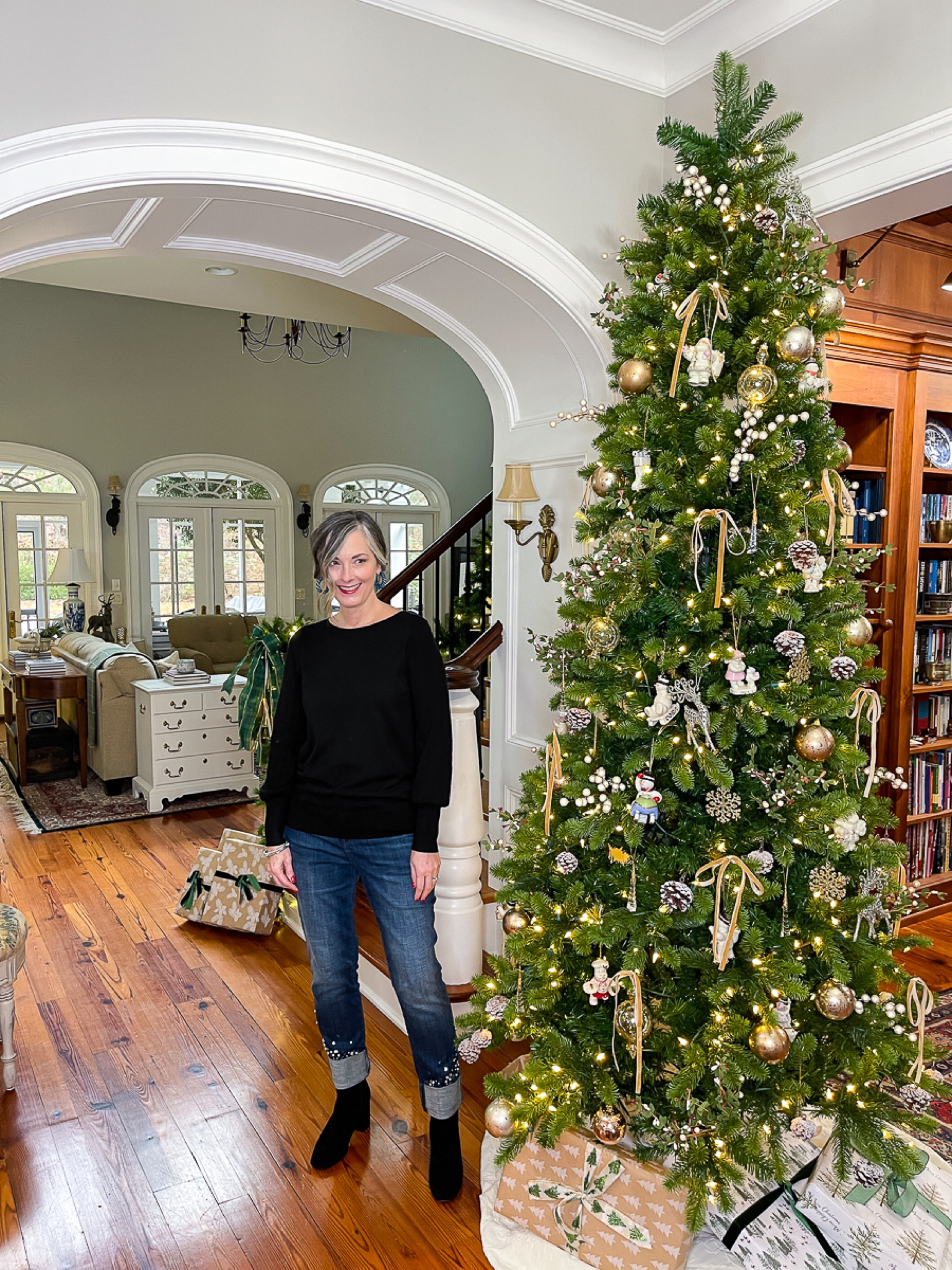 Loving this look from Chico’s! Jeweled jeans are sure to size in .5. Wearing a 1 in the black sweater. Paired with silver jewelry and boots true to size. #chicos #lovechicos

#LTKstyletip #LTKsalealert #LTKSeasonal