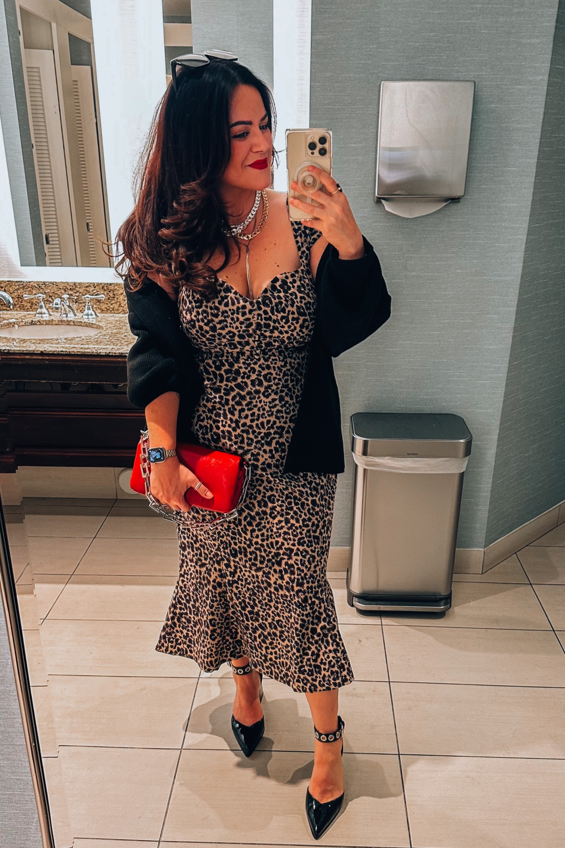 Midsize fall wedding guest dress- cocktail dress - leopard dress size xl 
Cardigan sweater xl 
Rivet heels tts 
Red handbag 
Strapless bra 38dd 
Smoothing undies TARYNTRULYXSPANX 
Kissproof red lipstick - unbreakable 

#LTKwedding #LTKmidsize #LTKSeasonal