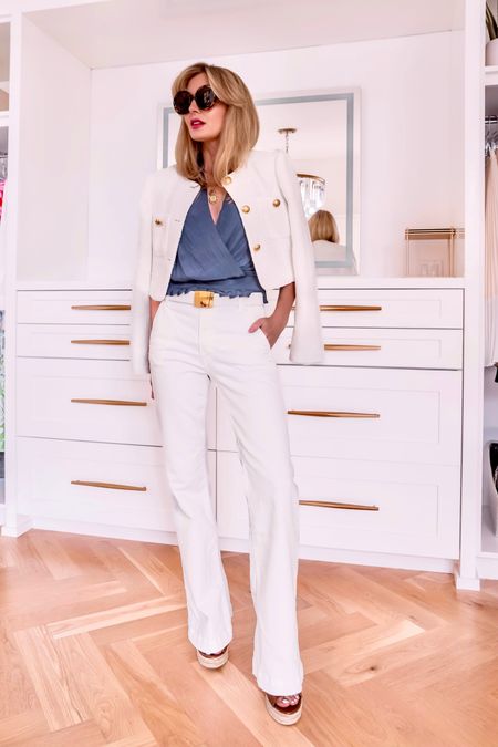 White jeans are a MUST-HAVE for spring and summer, and this pair from @saks is perfect for slimming and elongating your legs! #saks #sakspartner

In this look, I'm wearing a pair of ultra chic flared Joe's Jeans. The fit on these is SO flattering. The higher rise accentuates the waistline and adds length to the legs. I paired the jeans with a gorgeous pair of Michael Kors' wedges to really maximize on elongating my legs. Both the jeans and wedges are very affordable and versatile!

I paired the jeans with a pretty navy cap-sleeve top by Maje. The cap sleeve has a really flattering duel functionality... it can minimize broad shoulders OR add structure to small shoulders. So it works well for all body types! 

To finish the look, I layered on a beautiful cropped tweed Cinq a Sept blazer, Gucci sunglasses, and a really cool Mignonne Gavigan necklace. 

~Erin xo 

#LTKSeasonal #LTKOver40 #LTKStyleTip