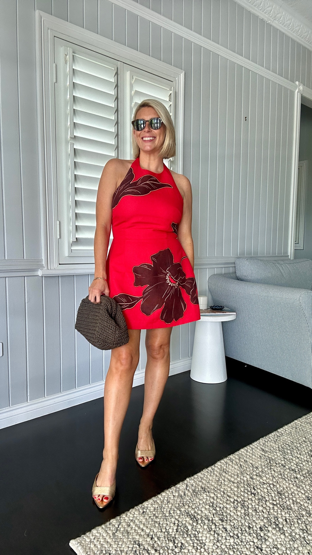 A little red halter neck mini dress with chocolate floral detail. Paired with gold and.m chocolate accessories  

Dress size 12. 

#LTKaustralia #LTKsummer #LTKpartywear
