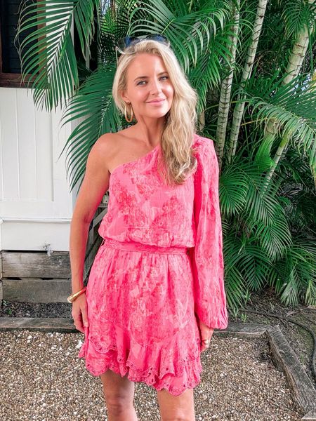 🌸 RESTOCK ALERT 🌸 This stunning vacay-ready pink dress is my favorite piece I packed for my trip to Belize last year! 

I LOVE the bright bold color, sexy one-shoulder style, and gorgeous fabric. The tie-belt highlights the waist, making it super flattering. It also has the most beautiful eyelet trim details. The lightweight material is very breathable and comfortable. And it hardly takes up any room in your suitcase! 

~Erin xo 

#LTKtravel #LTKstyletip #LTKSeasonal