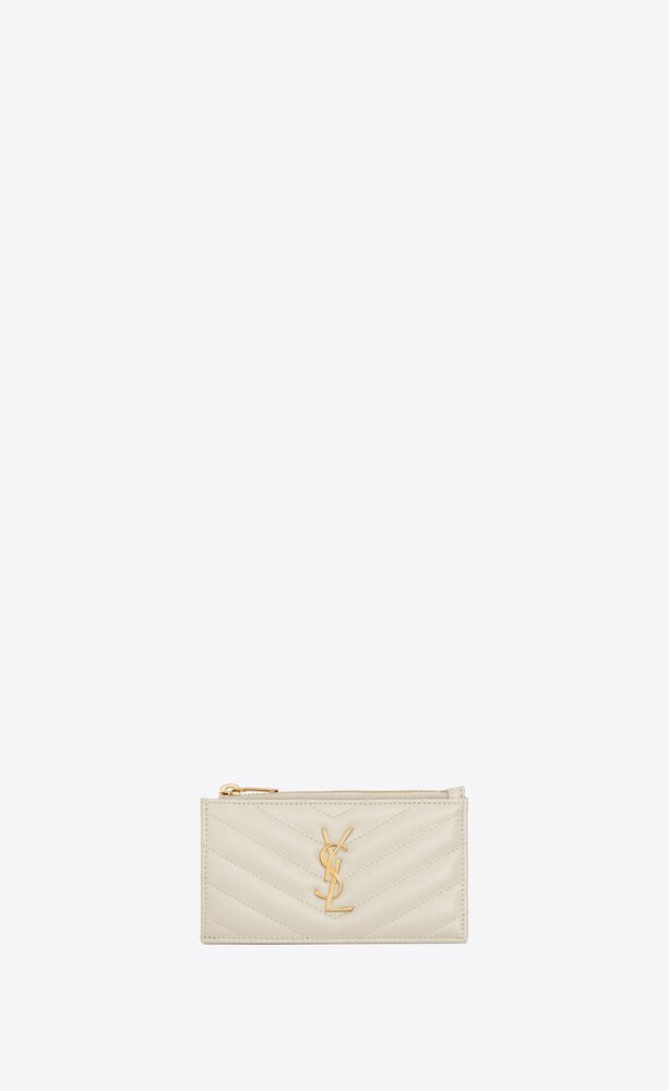 Zippered case made with metal-free tanned leather with metal YSL signature on the front and card ... | Saint Laurent Inc. (Global)