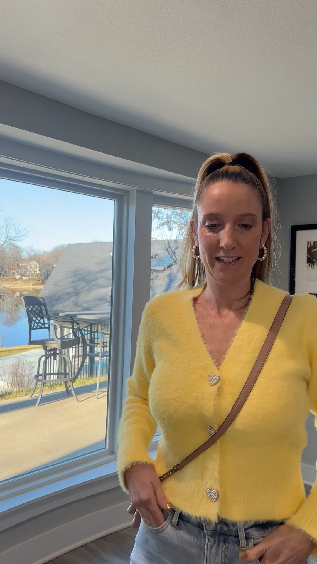 Bringing my own sunshine to the lake today! ☀️💛 This fuzzy yellow cardigan is the perfect antidote to a chilly January morning. Those heart buttons? I’m officially obsessed. Shop the full look and my favorite denim on my LTK! 🛍️ #WeatherbyLakeStyle #YellowCardigan #WinterBrights

Fuzzy yellow cardigan, heart buttons, V-neck knit, yellow sweater, light-wash jeans, distressed denim, tan crossbody bag, Weatherby Lake, winter fashion 2026, WFH style, cozy casual, transition outfit, LTKfind, feminine style, hearts, rhinestones, Easter 

#LTKSeasonal #LTKFindsUnder50 #LTKOver40