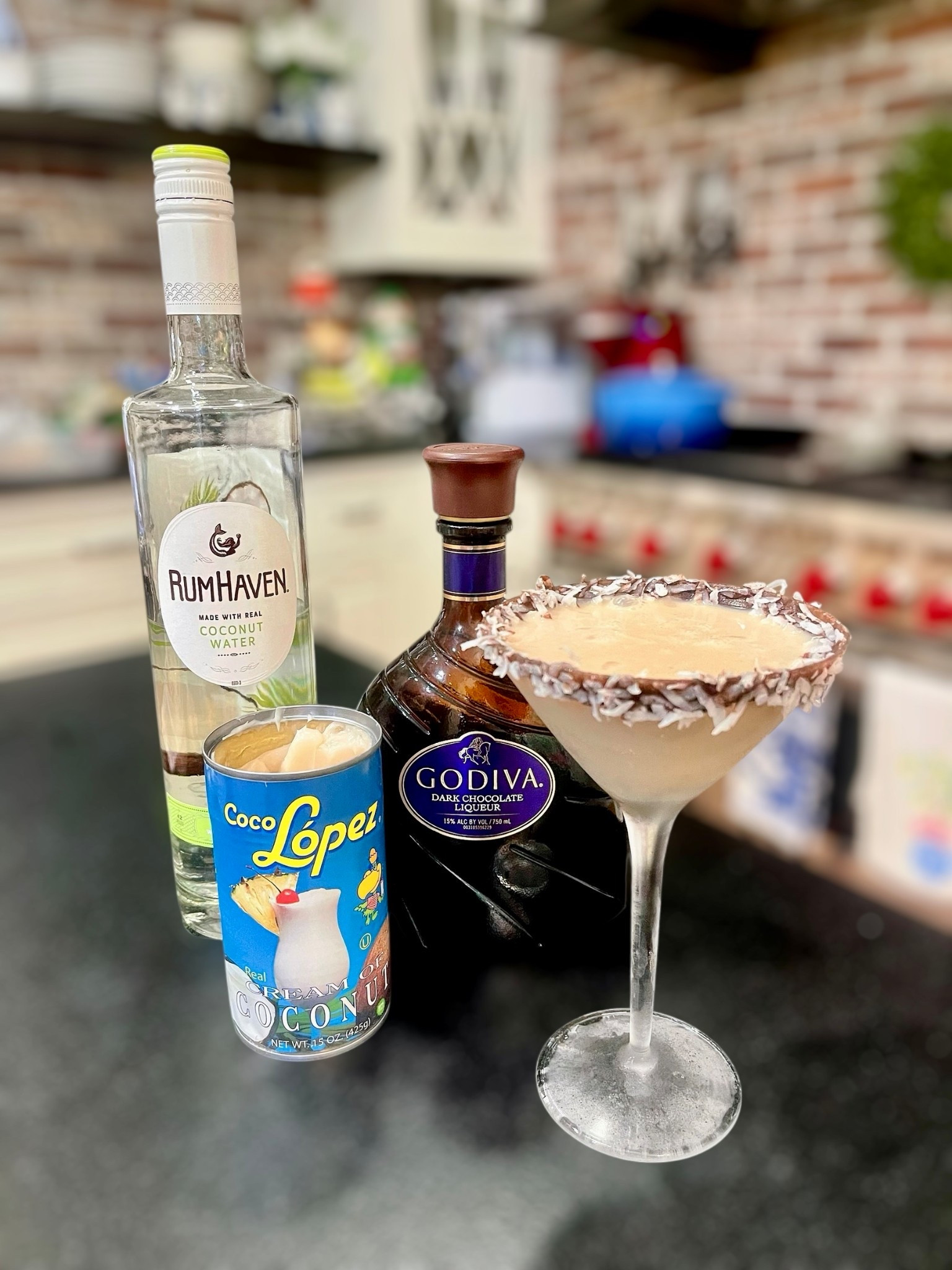 The ultimate dessert cocktail moment!
This rich and tropical drink is a chocolate-coconut dream come true—perfect for summer nights, girls’ night in, or date night at home!

Cocktail details:
I dipped the rim in melted dark chocolate and sweetened coconut flakes for a decadent finish.

Shaken with:
	•	1.5 oz coconut rum (RumHaven)
	•	1 oz Godiva dark chocolate liqueur
	•	1 oz cream of coconut (Coco Lopez)
	•	1 oz whole milk for extra creaminess

Shake with ice and strain into a chilled, rimmed glass—it’s like a boozy Almond Joy in a martini glass!

Perfect for chocolate lovers and tropical cocktail fans alike.
All ingredients linked + barware finds, too!

#ltkhome #ltkdrinks #cocktailhour #coconutrum #godivachocolate #creamycocktail #chocolatecocktail #dessertcocktail #summerdrinks #drinkstagram #entertainingathome


#LTKFindsUnder50 #LTKHome #LTKParties
