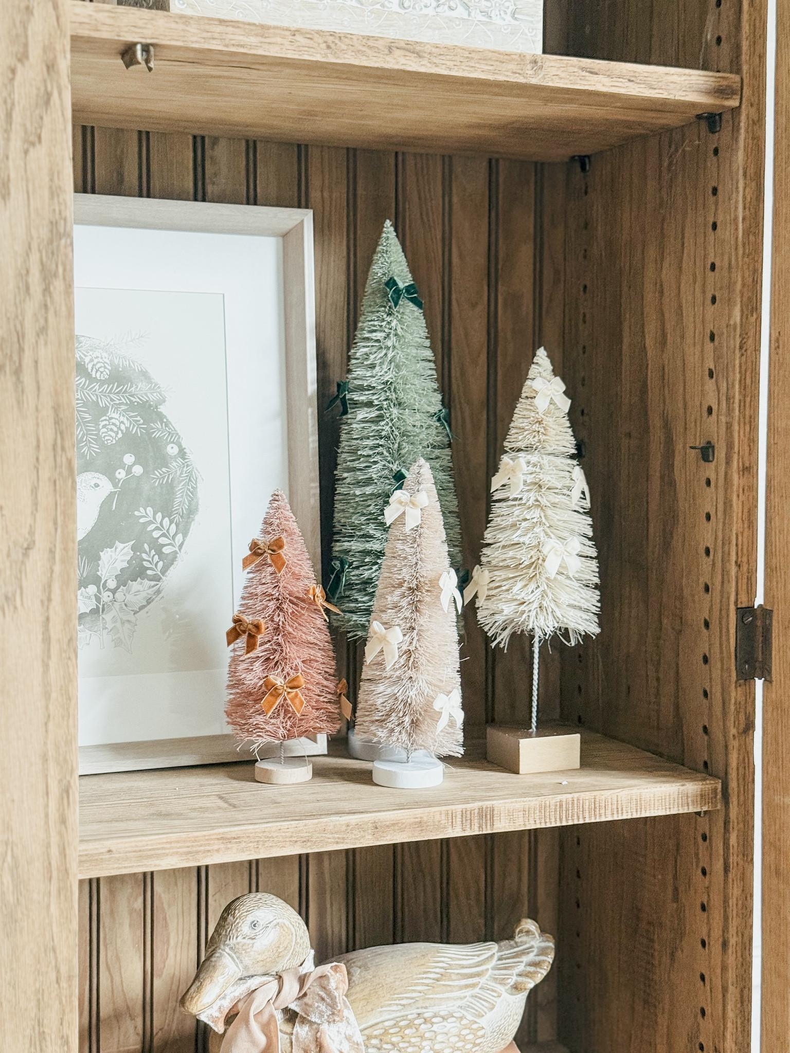 You know me I can’t resist a fun and easy diy! I have 568 bottle brush trees I’ve collected over the years. They are by far my favorite thing to decorate with so this was a fun way to dress a few of them up this year! I love to find affordable ones at Homegoods and Hobby Lobby but linked some for you as well as the cutie little bows that could be used for so many fun DIY’s! Comment SHOP below!



#LTKHome #LTKSeasonal #LTKHoliday