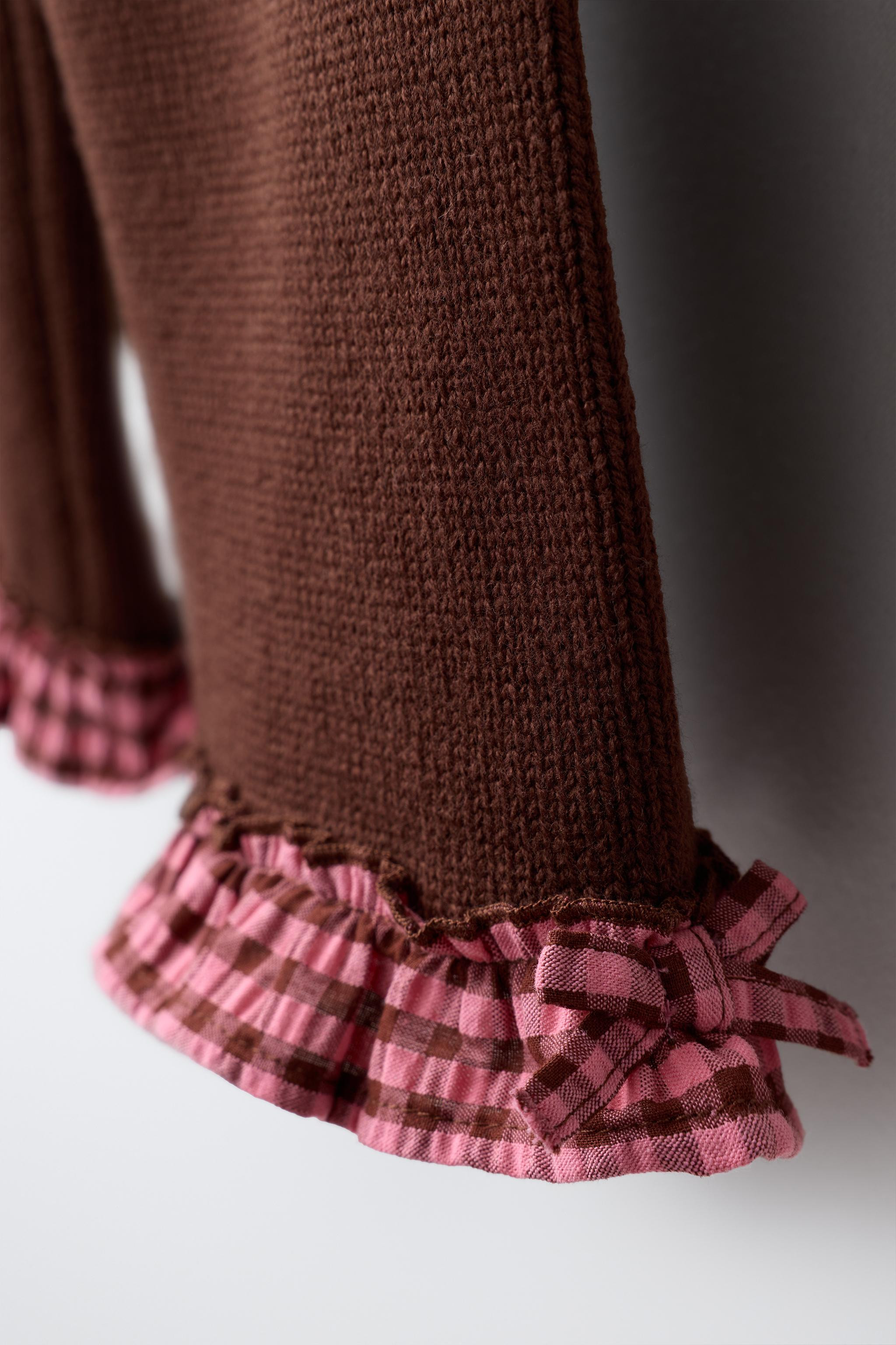 Knit culotte pants with elastic waistband. Hem detailed with a small ruffle, gingham check print,... | Zara US