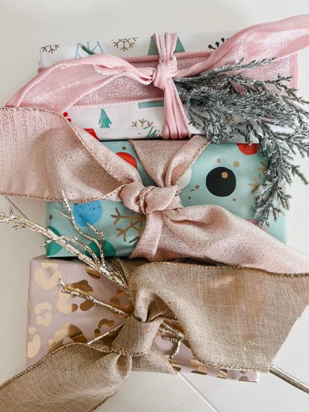 Had a few of you ask how to coordinate wrapping paper without being too “matchy,” so here you go! I go with a general color theme and try to find coordinating paper and ribbon from there. 🎁 This paper is super fun and whimsical with its pops of mint green, aqua blue, and pink! 😍 

#LTKHoliday