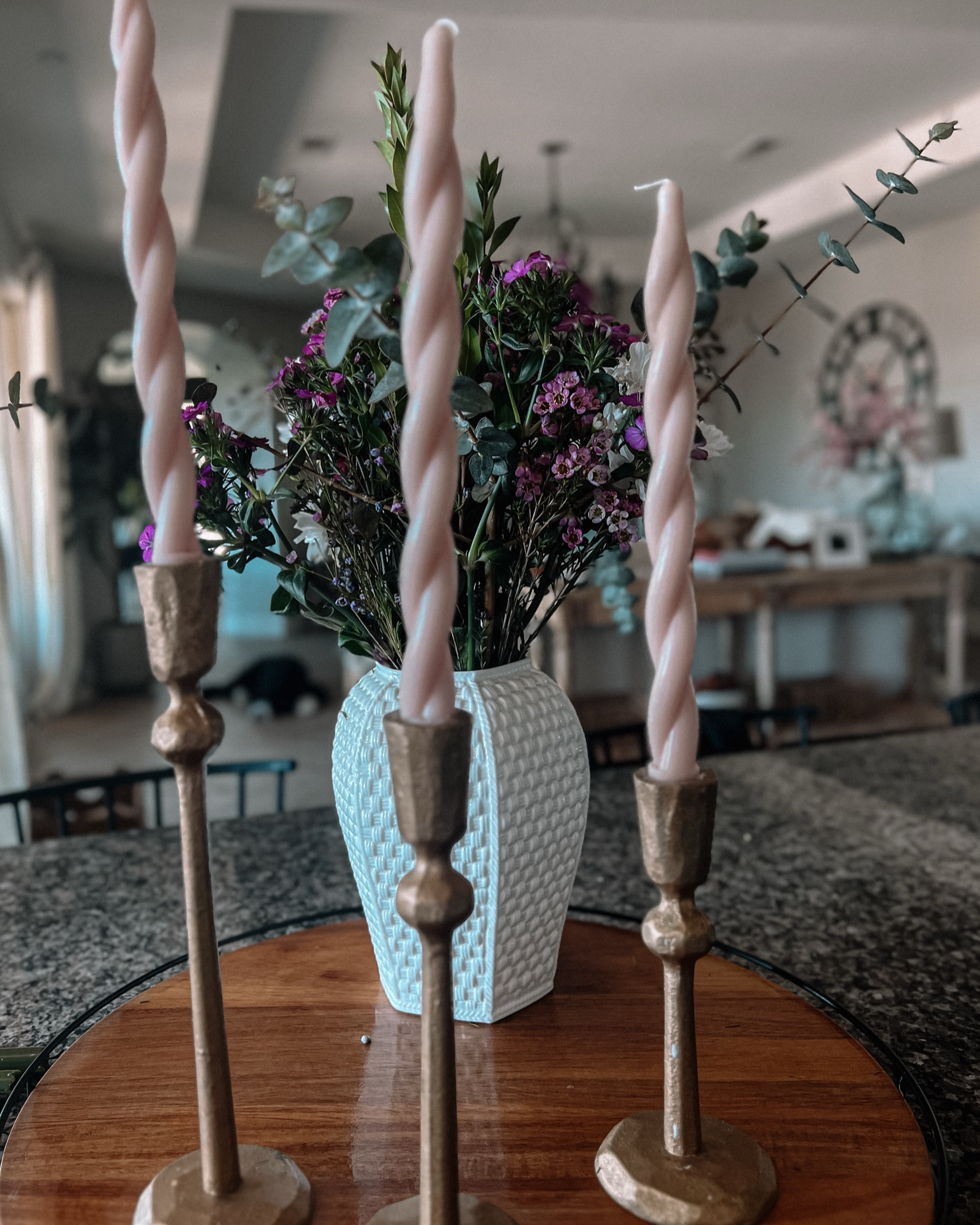 I had no idea how much joy a twisted candle could bring me, but here we are. It’s giving romantic but make it slightly dramatic, and honestly, I’m here for it.

This little setup happened unintentionally—just me grabbing a few things I love and letting them do their thing. The brass, the texture, the florals… it’s all just vibing together. And those candle holders? They’ve been with me for years and somehow keep getting better.

Proof that sometimes, the best moments in decorating (and in life) are the unplanned ones.

#moodydecor #candlemagic #cozyhomevibes 

#LTKHome