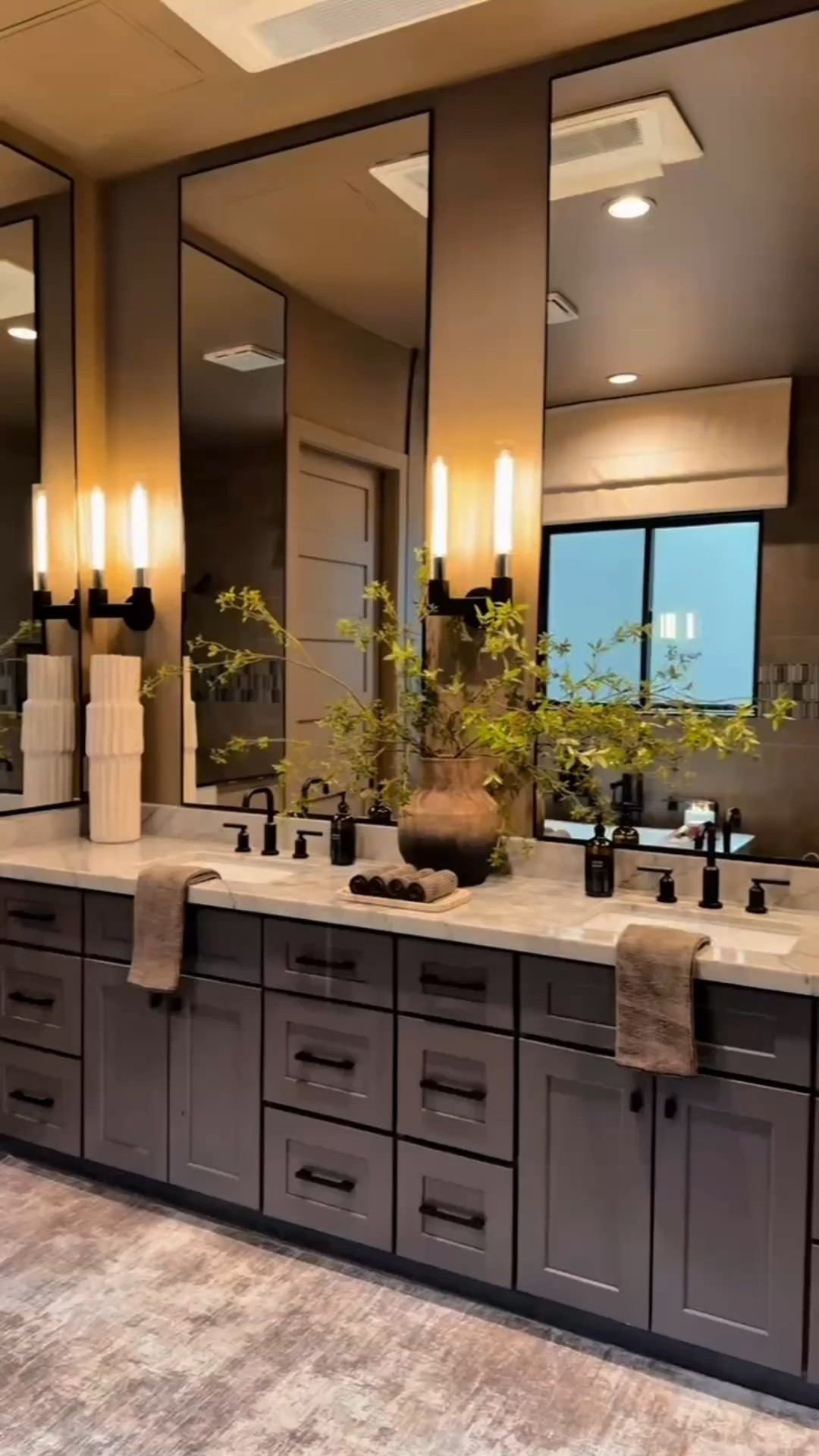 Changes we made:

Three affordable mirrors instead of one for more scale and impact. 💥 A warm, rich neutral brown paint to soften the grey. 💥Wall sconces to elevate the space without a full remodel. 💡 

A few functional and affordable decor finds to pull it all together

Bathroom makeover 
Moody bathroom 
Affordable bathroom finds 

#summerthompsonstyles

#LTKHome