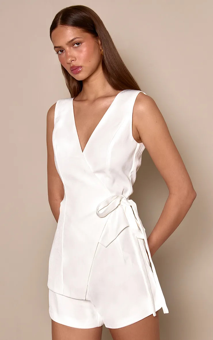 Playsuits | White Pinstripe Woven Wrap Detail Playsuit | PrettyLittleThing | PrettyLittleThing UK