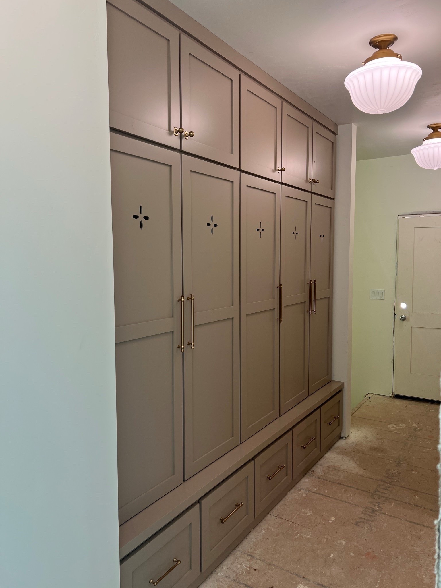 Mudroom new lighting & hardware in the mudroom! 

