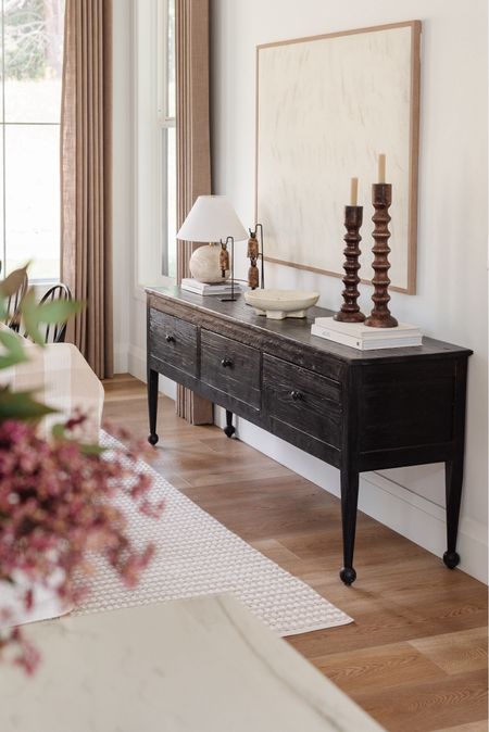 I haven’t shared our new sideboard yet, but I am absolutely OBSESSED!!! Look at those feet!! 

Dining room, sideboard, buffet, console table, entry table, sofa table, amber interiors, amber Lewis, wall art, curtains, Amazon home, rug, Loloi 

#LTKSaleAlert #LTKHome #LTKSeasonal