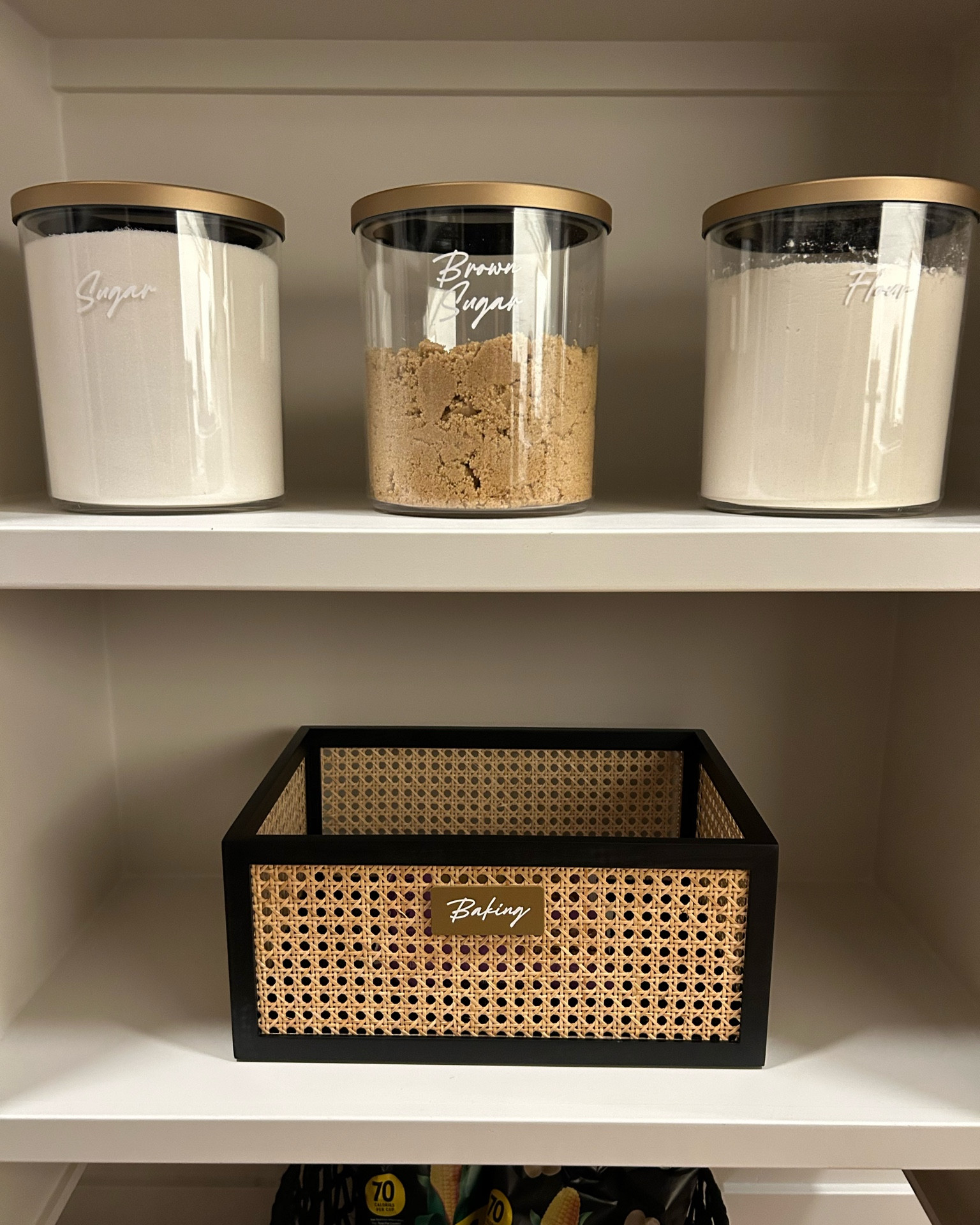 Ready to transform your pantry into a modern organized  sanctuary? We have you covered with their fantastic canisters and baskets. Here are some quick tips to make the most of them:

1. **Canister Chic**: Store dry goods like flour, sugar, and pasta in stylish canisters to keep them fresh and easily accessible.

2. **Basket Brilliance**: Utilize baskets to corral snacks, spices, or baking supplies, keeping everything neat and tidy on your shelves.

With these sleek canisters and this artisan basket your pantry will be both functional and fabulous!

#NeatMethod
#JKEHomereset
#HomeOrganizer
#AmberGamble
#JKE
#Professionalorganizing
#IdahoOrganizer
#containerStore
#RattanCane
#Pantryorganization

#LTKhome