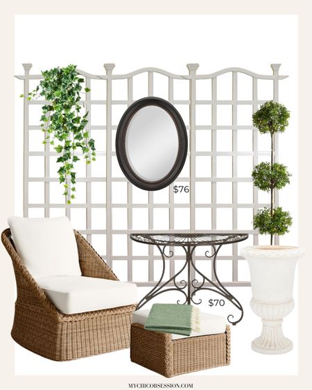 Traditional inspired outdoor furniture set up for your deck, patio, or porch. With a trellis, hanging mirror, planters, side table, wicker chair, and more, this is the perfect place to relax and read!

#LTKHome #LTKSeasonal