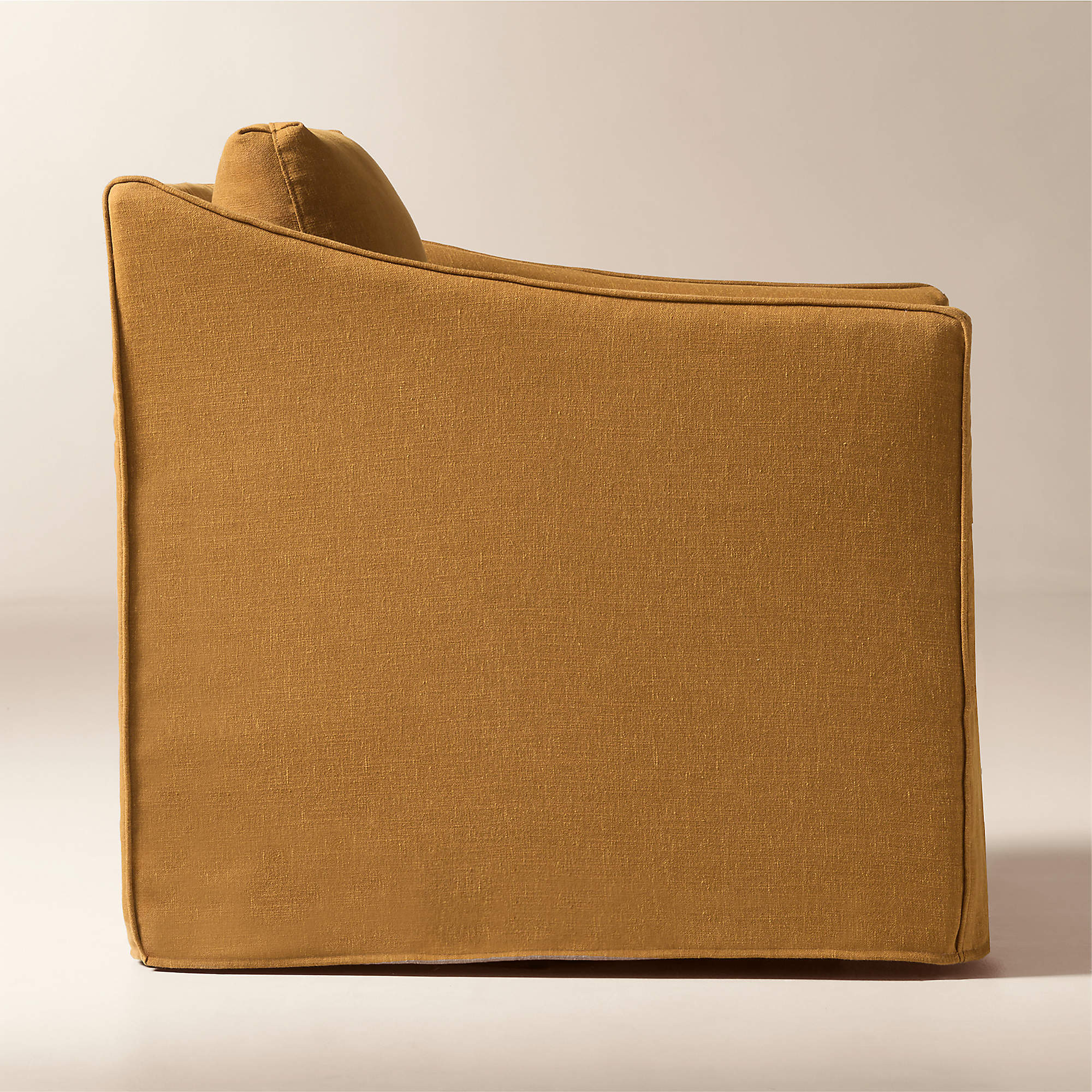 Bristol Cognac Slipcovered Performance Linen Swivel Chair + Reviews | CB2 | CB2