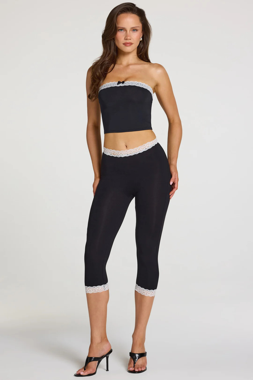 Modal Lace-Trim Mid-Rise Capri Leggings in Black | Oh Polly