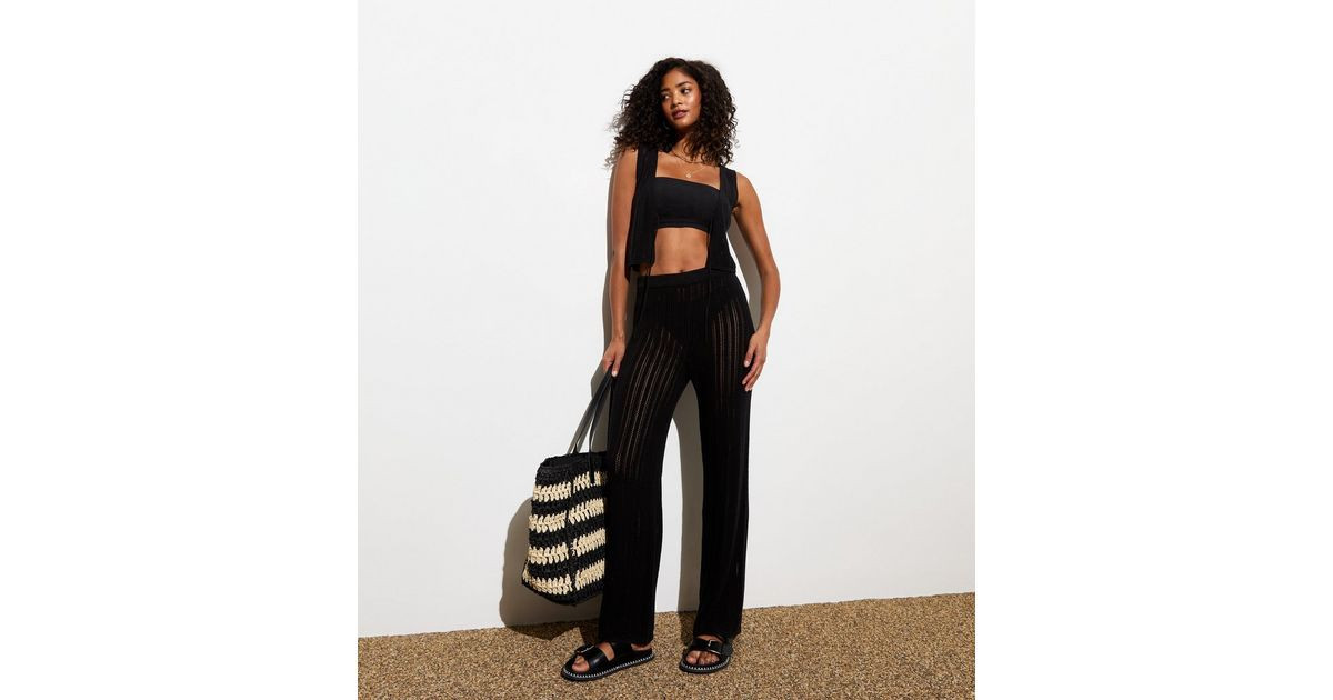 Black Pointelle Cotton-Blend Flared Trousers | New Look | New Look (UK)