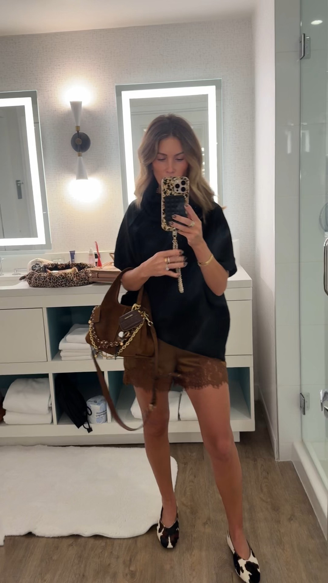 What I’m wearing for dinner tonight before Amazon crate or Summit starts tomorrow! Top is Amazon as well as the viral lace satin shorts and cow print flats & have gotten several compliments on my bag! It’s my favorite!! 

#LTKPetite #LTKHoliday #LTKOver40