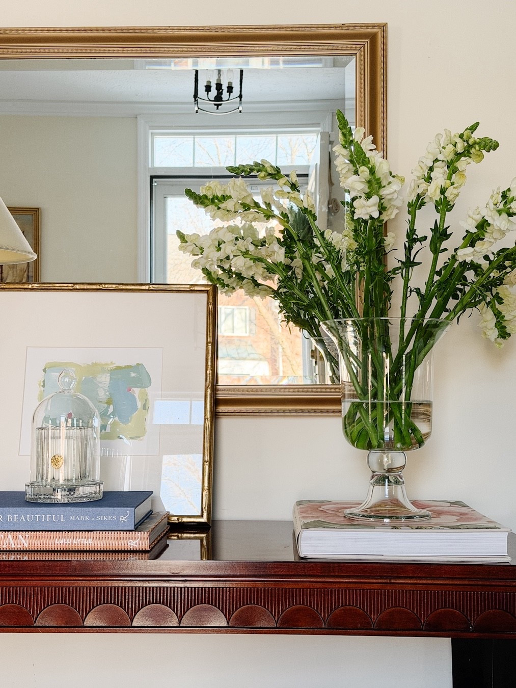 Entryway console table styling for a spring home refresh!

Foyer inspo, entryway refresh, console table refresh, glass hurricane , candle dish, glass cloche, coffee table books, white lamp, transitional home decor, traditional home decor, home decor for spring, spring home decor refresh 

#LTKHome #LTKSaleAlert #LTKSeasonal