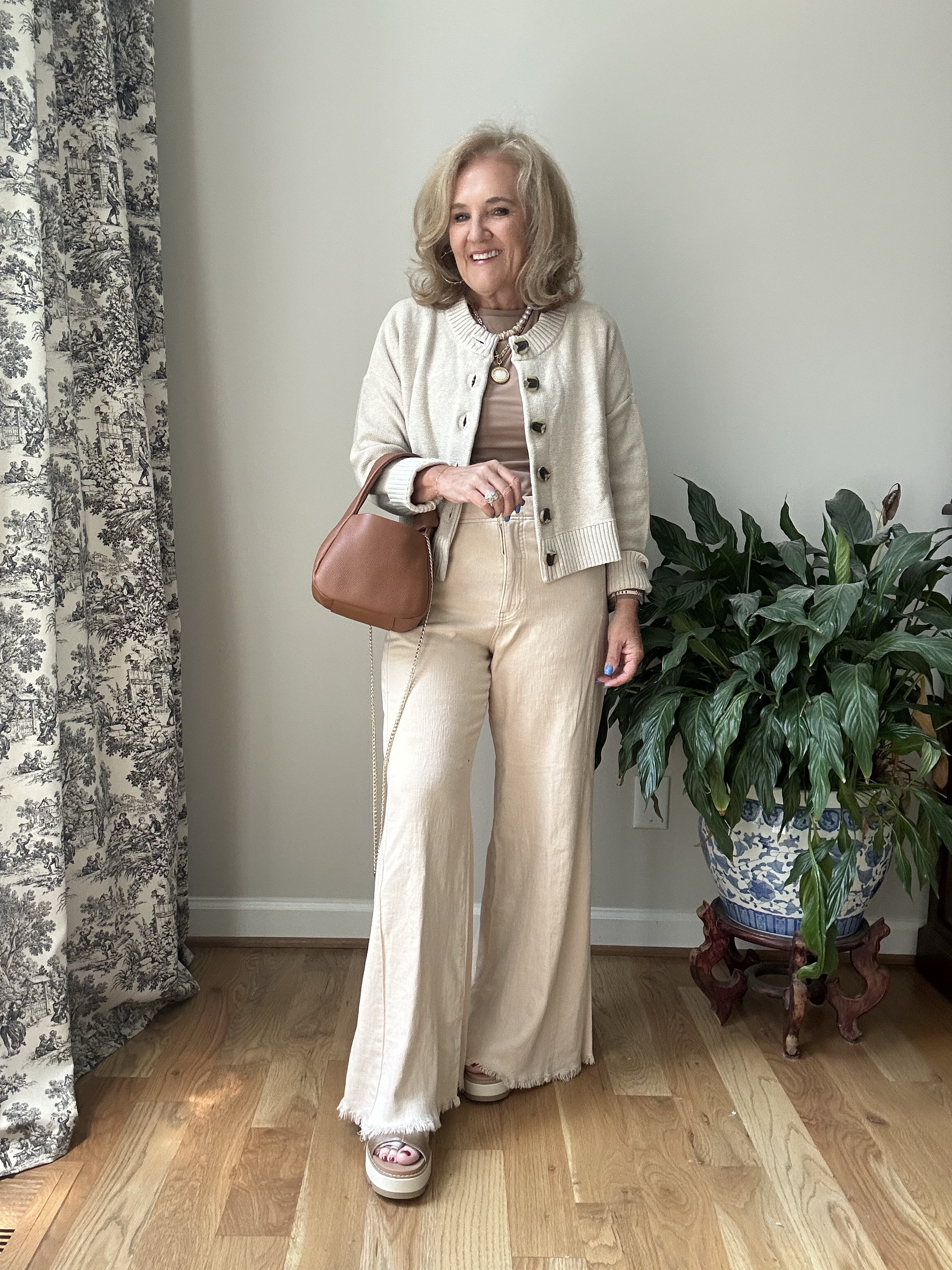 This neutral outfit is a wow.
Pumiey crewneck T-shirt I size up two to an extra large. I love this color. It’s called taffy
The new adi pant from Anthropologie is all I hoped for. It’s a linen blend fabric the frayed ham I’m wearing a 29 regular. Some colors do come in petite but this color does not. I just need a couple inch heal for it to not drag on the ground and it’s perfection
Quince  cardigan sweater I picked it up in this neutral  Also size medium 

Summer outfit, Anthropologie linen pants, business casual

#LTKSummerEdit #LTKOver40 #LTKWorkwear