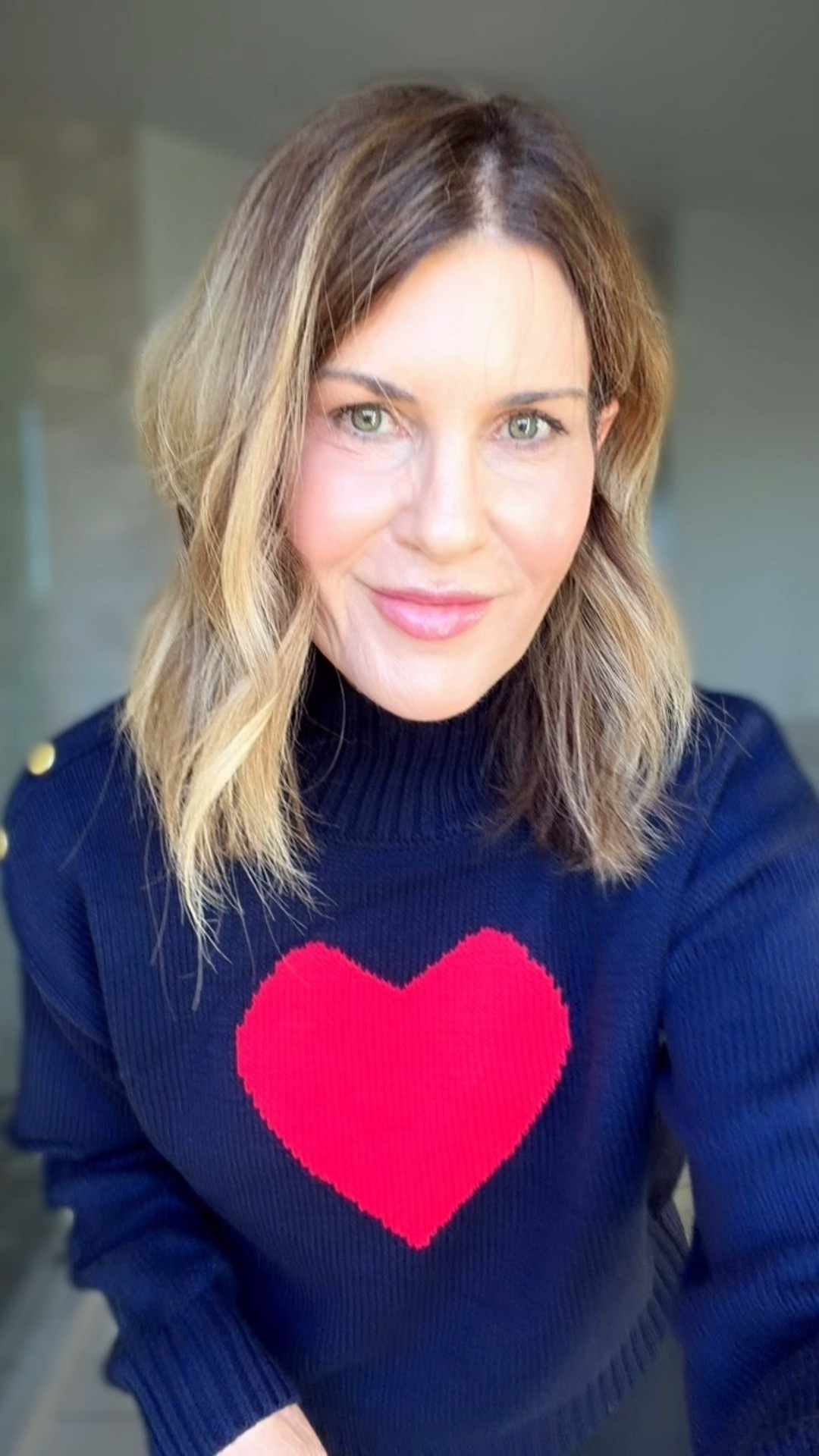 I’m wearing a medium in this adorable heart sweater which sold out most sizes. The stripe is still in stock so grab before it’s gone 