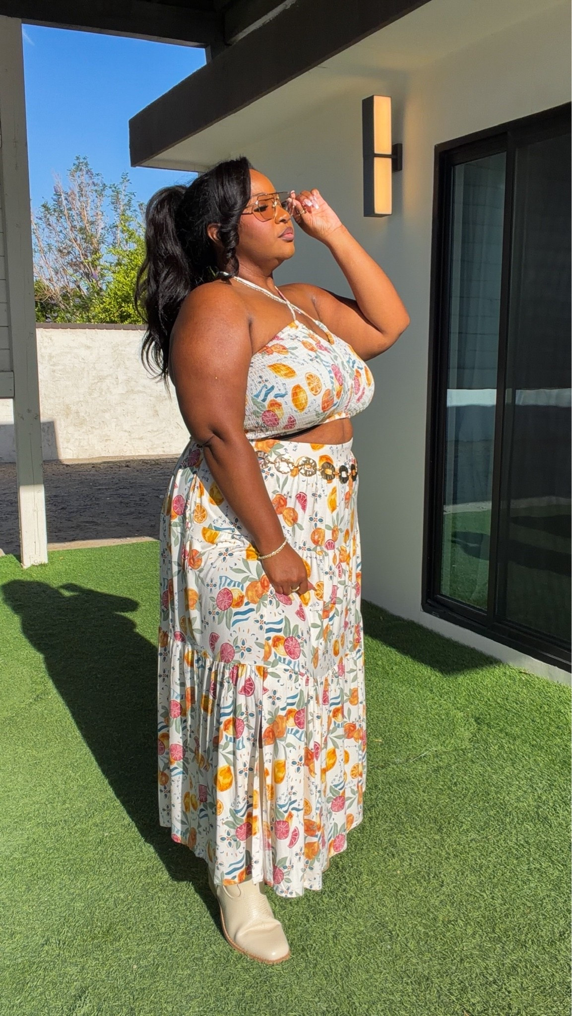Spring/Summer OOTD from @Torrid ☀️ I’m wearing the Smocked Maxi Skirt Set, accessorized with the Hammered Oval Chain Belt and their wide-width boots.