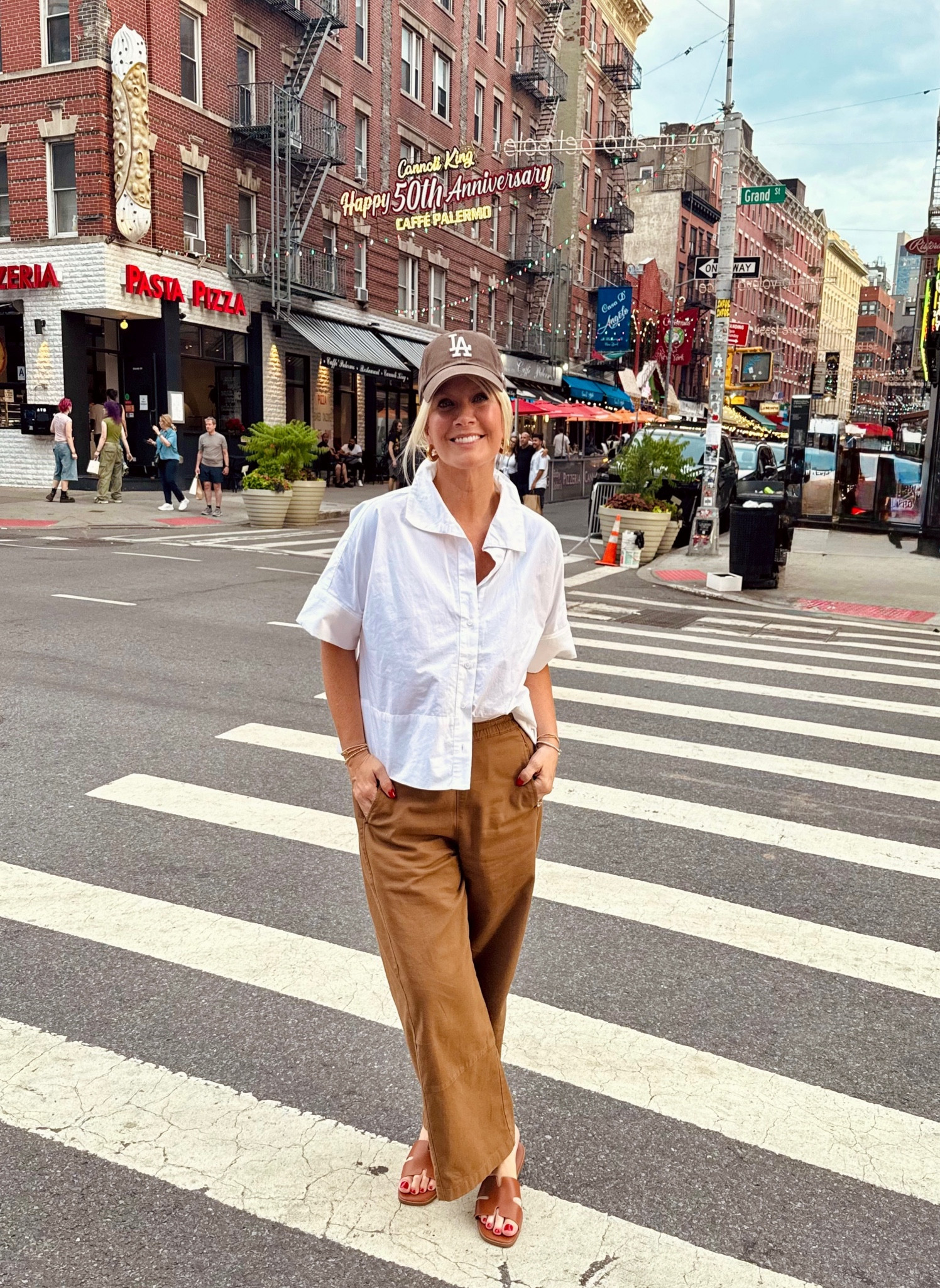 Feeling comfy chic in NYC! In an LA hat, I know, but I love the brown 🤎 These pants are sold out in my color but grab whatever color they have, because they are the most comfortable easy to wash and wear pants I own. Also, the Hermès’ sandal dupes are perfection and SO comfortable!!! This shirt is a bit spendy but I’m obsessed with the slight cropped, boxy fit. When you find the perfect white shirt, you’ve got to get it! (I also have it in the light blue and the color is so beautiful!)

#LTKSeasonal #LTKTravel #LTKOver40