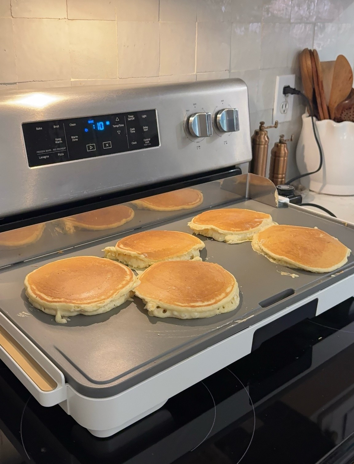 Our griddle is perfect for pancakes, sausage, and more! 
The XL surface allows you to cook lots of  items at once! 

Features: 
• XL family-sized cooking surface makes up to 15 pancakes or eggs at once to feed the entire family
• Durable, long-lasting material with soft matte premium finish
• Slim design for easy cabinet storage
• Detachable stainless steel backsplash to keep your counter clean while cooking
• Removable drip tray collects unwanted fats and oils from food
• Removable heat control with easy-to-use dial ranging from 200°F-400°F
• Cool-touch handles for convenient handling

#LTKmomlife #LTKdayinmylife #LTKHome