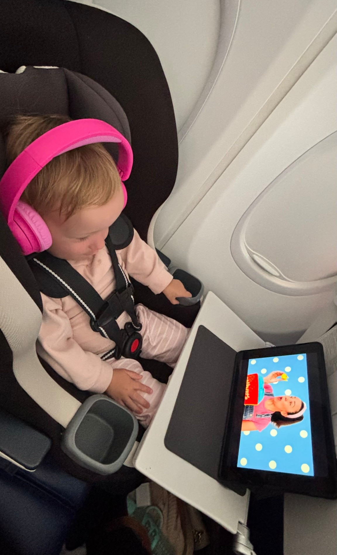 Booking her own seat with a car seat was a game changer!!! Didn’t make a peep entire flight. 